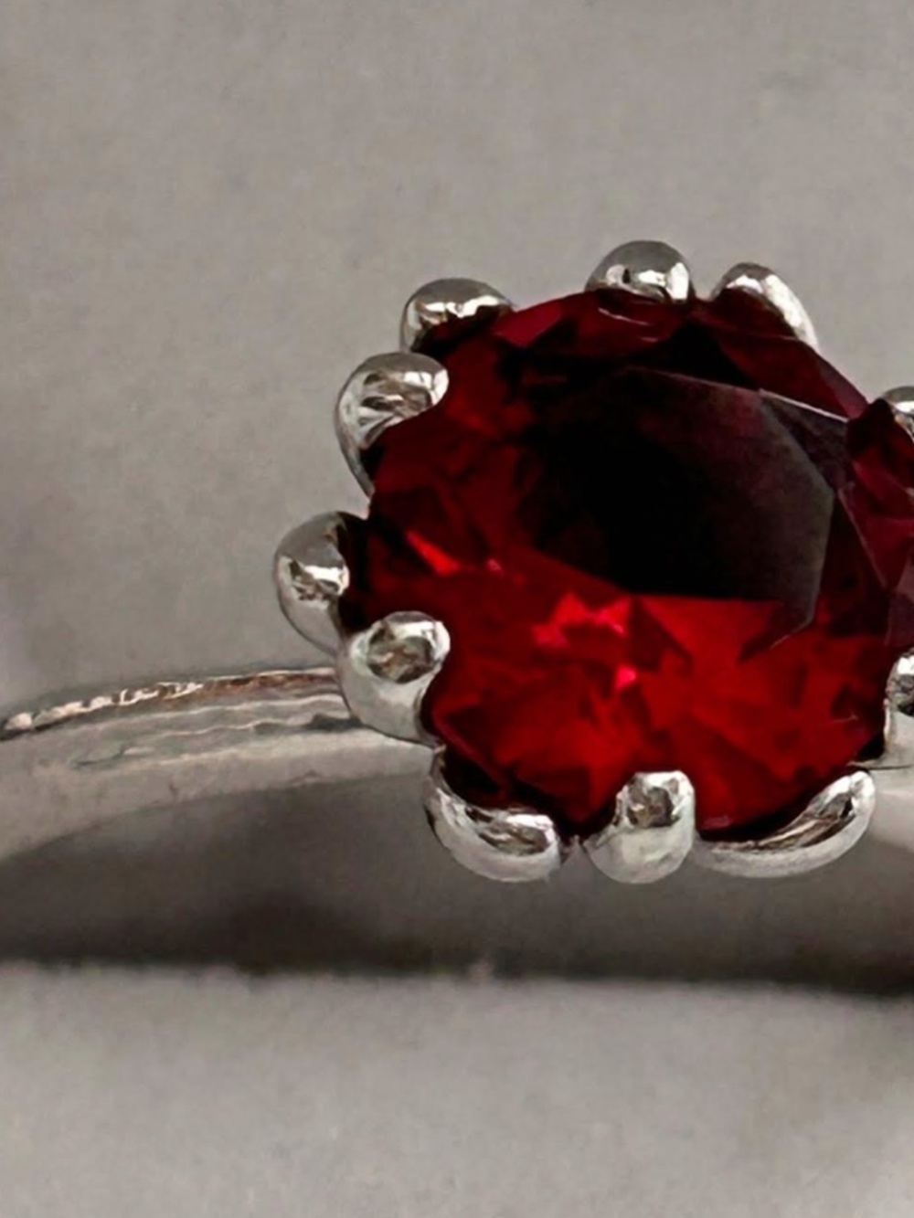 Silvertone Ring featuring Vibrant Red Round Cut Gemstone Size 8